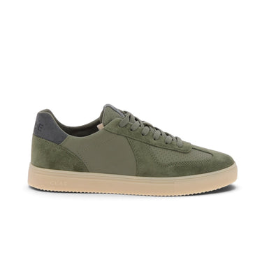 Baskets Clae Bastain olive en cuir et daim avec semelle en caoutchouc naturel, disponibles chez moodeshop
