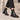 Boots Chelsea Billi bi en cuir espresso avec semelle artisanale cousue, portées avec un pantalon noir
