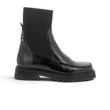 Boots Janelle moodeshop en cuir glacé noir avec tige élastique côtelée et semelle crantée légère