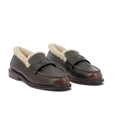 Mocassins penny loafer Toral en cuir vieilli marron avec doublure en fourrure de mouton, vendus par moodeshop