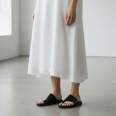 moodeshop black nappa leather thong sandals with a minimalist design and ultra-light rubber sole.