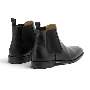 Bottines Chelsea Giorgio 1958 en cuir noir artisanal chez moodeshop, vue arrière avec semelle en cuir et gomme