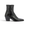 Bottines artisanales Pantanetti pour moodeshop en cuir noir avec talon de 5 cm et semelle cousue, vue de profil