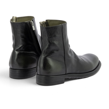 Bottines artisanales moodeshop Officine Creative en cuir patiné olive et noir avec fermeture éclair arrière