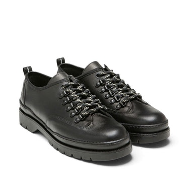 Chaussures basses Kleman Courrier cg noires en cuir artisanal avec semelle en gomme, vendues par moodeshop
