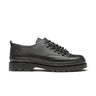 Chaussures basses artisanales Kleman Courrier cg en cuir noir avec semelle crantée en gomme, vue de profil