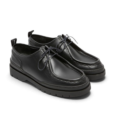 Chaussures homme Kleman Major en cuir noir avec semelle gomme antidérapante, disponibles chez moodeshop