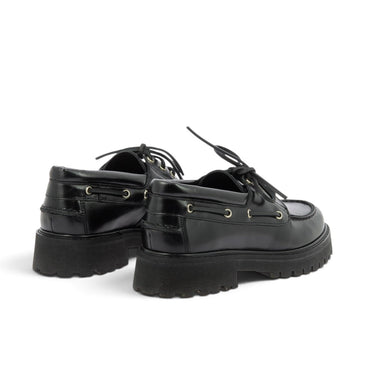 Mocassins bateau Maison toufet en cuir glacé noir avec semelle crantée, vendus par moodeshop