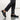 Mocassins penny loafer moodeshop en cuir lisse noir pour homme portés avec un pantalon habillé