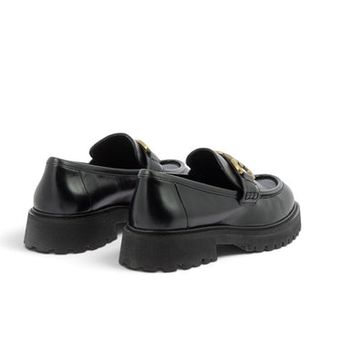 Mocassins Maison toufet Naomie en cuir glacé noir avec semelle commando épaisse, disponibles chez moodeshop.