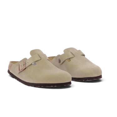Sabots Birkenstock Boston en cuir huilé couleur tabacco brown avec boucle réglable et semelle en liège chez moodeshop